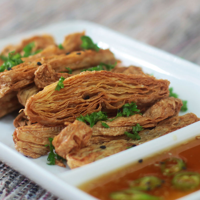 Crispy tofu skin fingers with spicy honey lemon ginger sauce
